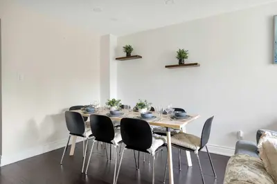 a dining room with a table and chairs at Family 4BDR 2BA with Basement in Mississauga in Mississauga