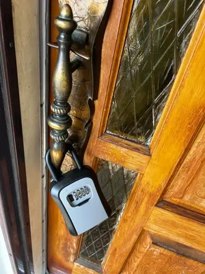 a door lock on a wooden door at Three Bedroom Spacious Bangalow with Free Parking, closer to commercial area and highways in Mississauga