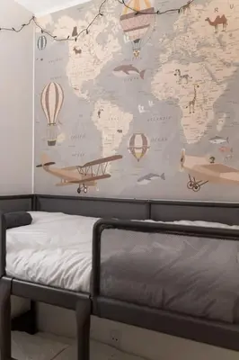 a bedroom with a map of the world with a bed at Top Graded Metropolitan Suite with Free Parking in Toronto
