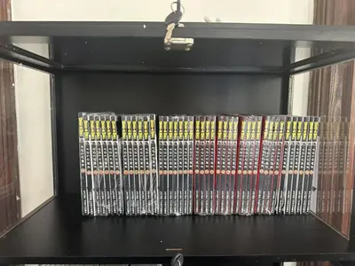 a shelf with a bunch of dvds on it at Comic House with Climbing Wall & Themes in Chesley