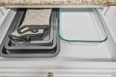 a drawer in a kitchen cabinet with a drawer at Comfy 2BR Apt near Beach and Downtown Free Parking in Oshawa