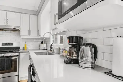 a kitchen with a counter top with a blender on it at 3BR Pickering Retreat with BBQ and Patio Delight in Pickering