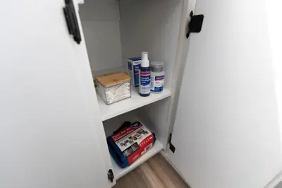 a door open to a pantry with products on shelves at Outdoor Sauna Hot Tub Playroom Port Dallhousie in St. Catharines
