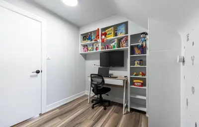 a home office with a desk and a computer at Outdoor Sauna Hot Tub Playroom Port Dallhousie in St. Catharines