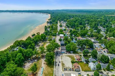 an aerial view of a town next to the beach at Crystal Tides Retreat in Fort Erie