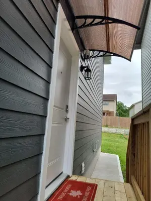 awning over the door of a house at ArbyManie's Place Newly Built Basement Apartment in London