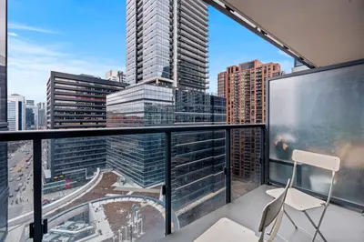 a balcony with a view of a city skyline at Amazing 1Bedroom 1BR Sheppard Metro Free parking in Toronto
