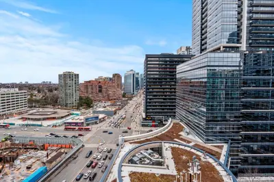 a view of a city with traffic on a highway at Amazing 1Bedroom 1BR Sheppard Metro Free parking in Toronto