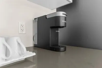 a coffee machine sitting on top of a counter at Heaven Beach House 2 min walk in Georgina