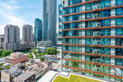 an aerial view of a city with tall buildings at Bright 1BD & Den in Downtown Toronto in Toronto