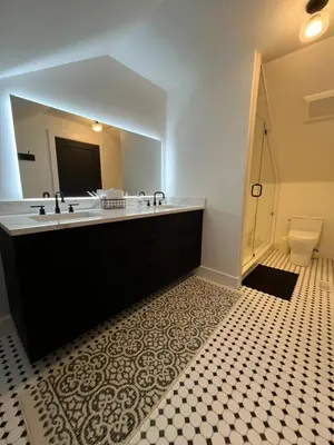 a bathroom with a sink and a mirror and a toilet at Duncan in Kimberley