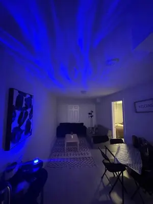 a living room with blue lights on the ceiling at Entire unit seprate entrance in Richmond Hill
