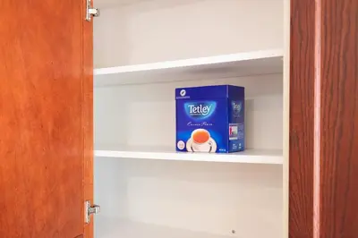 a box of milk is sitting on a shelf at Chic 1BR Downtown Getaway w King Bed in Toronto