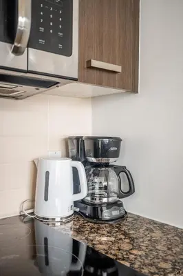 a coffee maker on a counter in a kitchen at 1BR High Floor View Downtown Toronto in Toronto