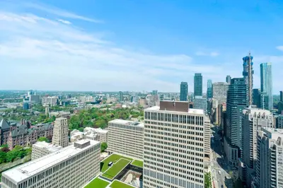 an aerial view of a city with tall buildings at Magnificent 1 Bd High floor view Downtown Toronto in Toronto