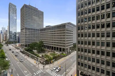 an aerial view of a city with tall buildings at Modern 1Bd & Den in Downtown Toronto in Toronto