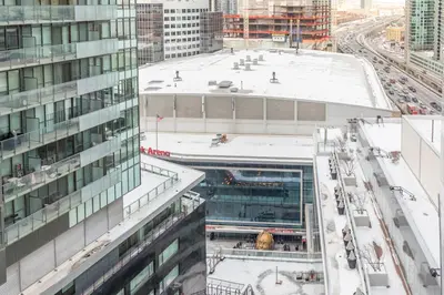 an overhead view of a building in a city at Classic 1BR & Den Apartment in Downtown Gym Pool in Toronto