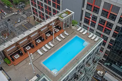 an overhead view of a swimming pool on top of a building at Elegant 1 Bedroom in Downtown Toronto in Toronto