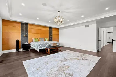 a large room with a bed and a large rug at GlobalStay Luxury 4 Bedroom House Wonderland Vaughan in Vaughan