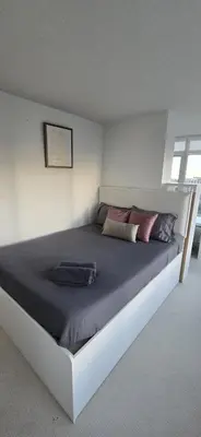 a bedroom with a large bed in a room at Spectacular Large 3 Bedroom 3 Bath Condo Downtown Toronto Lakeview in Toronto