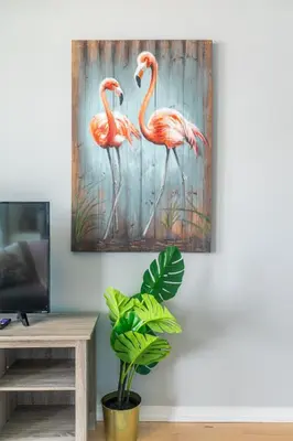 two flamingos standing in the grass painting at 1 Bedroom Condo Bremner Blvd Downtown Toronto in Toronto