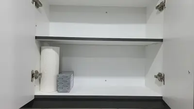 a bathroom with two rolls of toilet paper and a shelf at 3 bdrm 3 bath bsmt Brampton Toronto, Sleeps 16 in Brampton