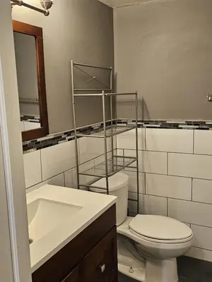 a bathroom with a toilet and a sink at 1 BR Bsmt, Sep Entrn, Fre Prkn, Wi-Fi, Ktchn, Lndry in Mississauga