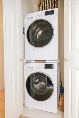 two washing machines stacked on top of each other at Dundas and Brock Suitel in Toronto