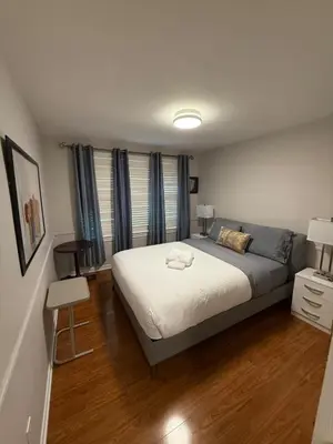 a bedroom with a large bed in a room at Spacious 5-Bedroom House in Thornhill in Vaughan