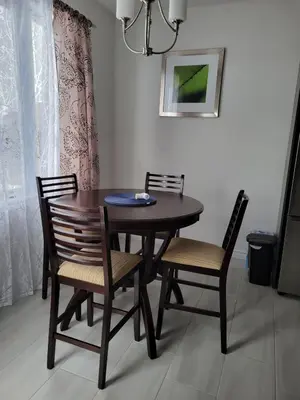 a dining room table with two chairs and a table and chairsktop at Newly constructed 3-Bedroom-Hyde Park- close to UWO and Hospital in London