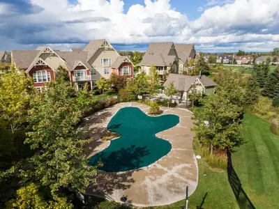 an aerial view of a house with a golf course at The 19th Hole at Blue with Hot Tub in Blue Mountains