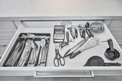 a drawer filled with lots of kitchen utensils at Luxe 4BR Retreat w Heated Pool Hot Tub and BBQ in Whitby