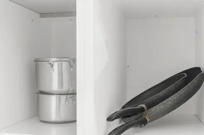 a knife and a pot in a refrigerator at Modern 2-Bed, 2-Bath BSMT suite with Pvt Entrance Free Parking and Wi Fi in Pickering