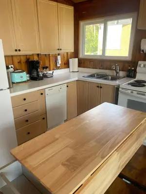 a kitchen with a wooden counter top in a kitchen at Lakefront Lake Erie with Amazing Views 3BR Pet Friendly 1 HR from Hamilton and Niagara