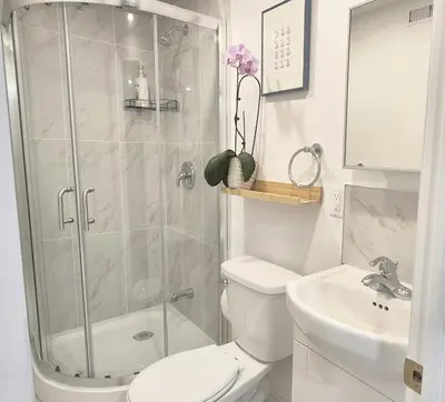 a bathroom with a shower and a toilet and a sink at Pacific Mall Bright & Cozy Rooms with Privated Bathrooms in Toronto