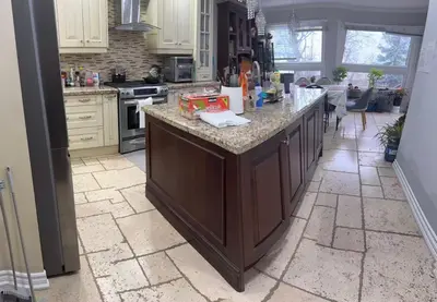 a kitchen with a large island in the middle at Private bedroom 202 in Mississauga