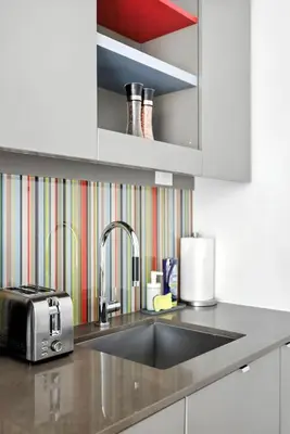 a kitchen counter with a sink and a toaster at Modern Studio Retreat in Downtown Toronto in Toronto