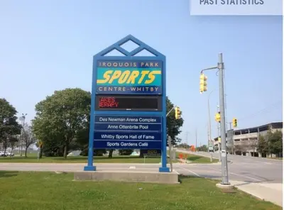 a sign for a sports centre written on a street at Cozy 2 Bedroom Suite, 5 mins from Thermea Spa in Whitby