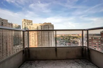 a balcony with a view of a city at Elegant 2BR 2BA Condo Heart of Mississauga SQ1 in Mississauga