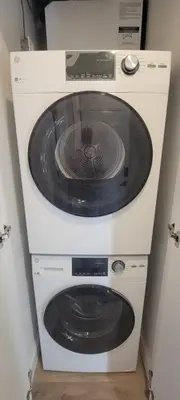 a microwave oven with a burner on top of it at Bright Garden Suite 1 Bedroom and Den in Toronto