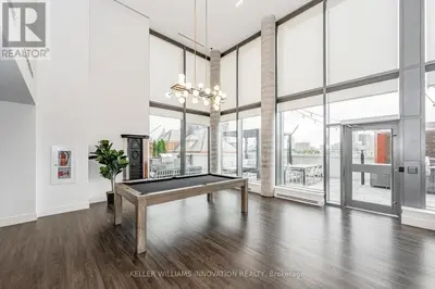 a large white room with a pool table in it at Hydropool Spa Hot Tub Bowling Alley Patio BBQ Games in Kitchener