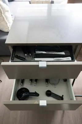 a drawer filled with knives and other kitchen utensils at Chic 1-Bedroom Downtown Toronto Getaway in Toronto