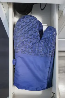 a blue padded chair in a shelf in a room at Trendy 1BR Condo Free Parking Downtown Toronto in Toronto