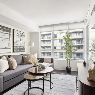 Stylish 1BR Condo with Patio Steps from Waterfront