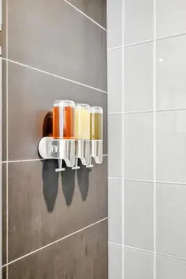 a wall mounted spice rack in a bathroom at Family-Friendly Sleep 8 Steps to all Attractions in Toronto