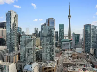 a view of a city with tall buildings at Ritzdale Suites - Toronto's Entertainment District in Toronto