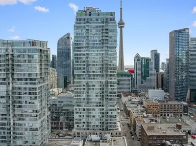 a view of a tall building in a city at Ritzdale Suites - Toronto's Entertainment District in Toronto