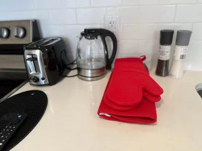 a red napkin sitting on a counter with a blender at Bright Escape Falls Retreat in Niagara Falls