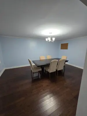 a dining room with a table and chairs at Peaceful Country Home on 25 Acres of Wooded Land in Alliston