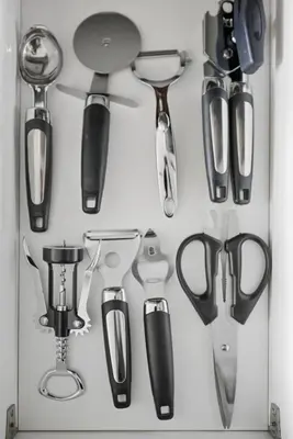 a bunch of different types of utensils in a drawer at Modern Lakeside 1BR Condo in Downtown Toronto in Toronto